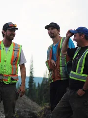 Tyson Lee, Parker Schnabel and Mitch Blaschke mid conversation - happy