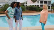 Contributors Keisha Echols (C) and Echo Robinson (L) share a laugh with real estate agent Frankie Gregory (R) at the pool at Resort Shores as seen on HGTV's Beachfront Bargain Hunt.