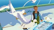 Rico verteidigt seinen Fischfang gegen hungrige Möwen, die auf seinem Boot auftauchen. Rico verteidigt seinen Fischfang gegen hungrige Möwen, die auf seinem Boot auftauchen.