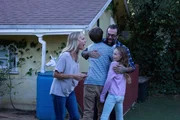 Owen and Audrey Vogel hug host Ballatore as their mother Darlene Vogel looks excited.