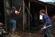 Bam Bam Brown using sledge hammer on demolition site, Gabe Brown with hammer.
