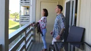 Contributors Carlos Perez (R) and Estefania Perez (L) are in awe of the incredible views from the balcony at Lighthouse Point as seen on HGTV's Beachfront Bargain Hunt.