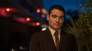 A detective looks forward. A detective looks forward.