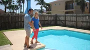 Contributors Ariel Vasquez (L) and Nicole Eymard (R) checkout the beautiful swimming pool in the backyard of Bayside Sanctuary as seen on HGTV's Beachfront Bargain Hunt.
