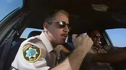 Deputy James Garcia (Carlos Alazraqui, l.)
