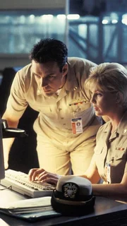 Harmon Rabb, Jr. (David James Elliott), Meg Austin (Tracy Needham)