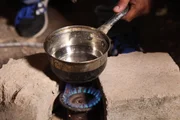 MEXICO- A pan of liquid meth is cooked in a shack to produce super meth.