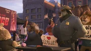 l-r:Clawhauser (Nate Torrence), Chief Bogo (Idris Elba)