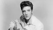 "King of Rock’n’Roll": Als Popsänger und Gitarrist schreibt Presley Geschichte. Bis heute gilt er als einer der einflussreichsten Musiker aller Zeiten.
