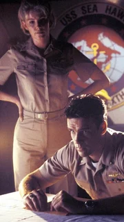 Harmon Rabb, Jr. (David James Elliott), Meg Austin (Tracy Needham)