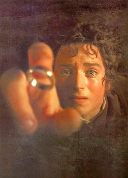 "Ein Ring, sie zu knechten, sie alle zu finden, ins Dunkel zu treiben und ewig zu binden." - Das Schicksal der Freiheit von Mittelerde liegt in den H&auml;nden des Hobbits Frodo Beutlin (Elijah Wood).