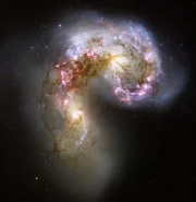 Mega Disasters II Gamma ray Burst, Naturkatastrophen Gammablitze This new NASA Hubble Space Telescope image of the Antennae galaxies is the sharpest yet of this merging pair of galaxies. During the course of the collision, billions of stars will be formed. The brightest and most compact of these star birth regions are called super star clusters.