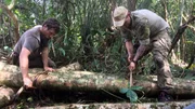 Josh James and Grady Powell tying logs together in Nicaragua.