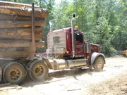 Loaded truck leaves the deck for the mill.