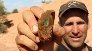 Joe Taranto with opal find Opalton QLD Joe Taranto with opal find Opalton QLD