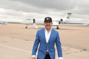 Grant Cardone with his jet in background (Grant Cardone)
