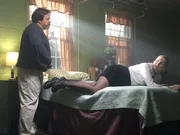 Perry hitting Hollie with a belt at her school for drinking.