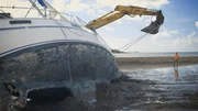 The full professionals want to use the vehicle to hook up a sailing yacht that was washed ashore by Hurricane Debbie. The full professionals want to use the vehicle to hook up a sailing yacht that was washed ashore by Hurricane Debbie.