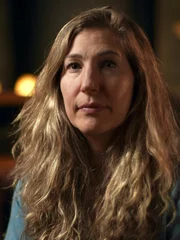 Interviewee, Katie Heath, looking at camera, mid shot