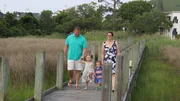 Contributors Emily Bishop (R) and Brian Bishop (L) take their son Paxton (CR) and daughter Addison (CL) to the Roanoke Marshes Lighthouse for some family fun as seen on HGTV's Beachfront Bargain Hunt.
