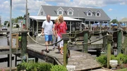 Contributors Jennfier King (R) and Jeremy King (L) are impressed as they approach Captain's Walk and like what they see as seen on HGTV's Beachfront Bargain Hunt.
