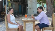 Contributors Laura Michaud (L) and JP Michaud (R) enjoy some drinks as they discuss which beach home to purchase in Ambergris Caye, Belize as seen on HGTV's Beachfront Bargain Hunt. Contributors Laura Michaud (L) and JP Michaud (R) enjoy some drinks as they discuss which beach home to purchase in Ambergris Caye, Belize as seen on HGTV's Beachfront Bargain Hunt.