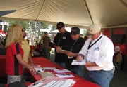 Bobby, Mike, and Justin sign up for the loader competition at the Expo.