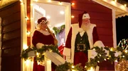 Mr. & Mrs. Claus standing on ramp. Mr. & Mrs. Claus standing on ramp.