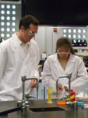 Jarrod in lab with young attractive student.