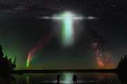 People are watching UFOs in the night sky. Elements of this image furnished by NASA. nasa urls used for this collage: https://www.nasa.gov/feature/goddard/2018/mystery-of-purple-lights-in-sky-solved-with-help-from-citizen-scientists https://www.nasa.gov/sites/default/files/thumbnails/image/dsc_0225-pano-sm_0.jpg https://images.nasa.gov/details-GRC-1961-C-57748.html