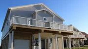 Breezy View is a large beach home with tons of space underneath for storage and relaxing, plus tons of deck space as well, as seen on HGTV's Beachfront Bargain Hunt. Breezy View is a large beach home with tons of space underneath for storage and relaxing, plus tons of deck space as well, as seen on HGTV's Beachfront Bargain Hunt.