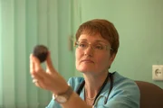 Chelyabinsk, Russia: Dr. Marina Posina, holding a fragment of the meteorite.