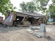 Dauphin, Manitoba, Canada: A damaged home.