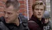 L-R: Jack Dalton(George Eads) and Angus "Mac" MacGyver (Lucas Till)