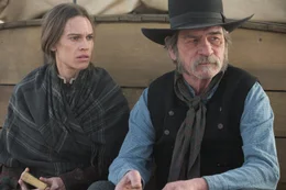L-R: Mary Bee Cuddy (Hilary Swank) and George Briggs (Tommy Lee Jones)
