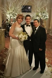 New York, NY, U.S.A, -- Irving and Theresa Gonzalez with Irving's brother Lamar Edwards in the middle, at Kleinfelds Bridal on TLC's "Say Yes to The Dress" in New York City.