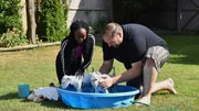 Joan Nansambu and Greg Chillak continue to give the dogs, Daisy and Lucy, a bath in the backyard. Joan Nansambu and Greg Chillak continue to give the dogs, Daisy and Lucy, a bath in the backyard.