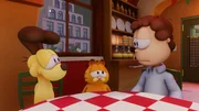 Odie, Garfield und Jon (v.l.n.r.) sind niedergeschlagen, weil Vito sein Talent zu Kochen verloren hat.