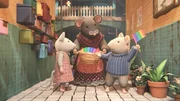 Oma Gouda (Mitte) hat für Julia (links) und Sam (rechts) einen langen Schal in Regenbogenfarben gestrickt. Die beiden erhoffen sich von dem künstlichen Regenbogen, dass er den Regen beendet, der seit Tagen das Spielen im Freien verhindert. Oma Gouda (Mitte) hat für Julia (links) und Sam (rechts) einen langen Schal in Regenbogenfarben gestrickt. Die beiden erhoffen sich von dem künstlichen Regenbogen, dass er den Regen beendet, der seit Tagen das Spielen im Freien verhindert.