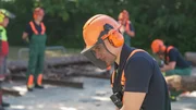 Dennis at a training course with a chainsaw Dennis at a training course with a chainsaw