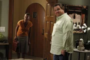 L-R: Adoption Official (Michelle Anne Johnson), Cameron Tucker (Eric Stonestreet)