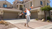 As seen on My Lottery Dream Home, host David Bromstad poses in front of a spacious townhome for potential homebuyer and lottery winner, Kelly McFarland.