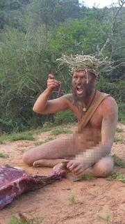 Jamie holding animal meat Jamie holding animal meat