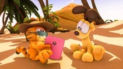 Garfield verliert sich in Urlaubsphantasien.