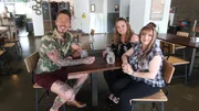Host David Bromstad (left) meets with Brandy Plowman (center) and Anissa Brooks (right) at deliberation. Host David Bromstad (left) meets with Brandy Plowman (center) and Anissa Brooks (right) at deliberation.