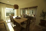 The renovated dining room and living room. The renovated dining room and living room.