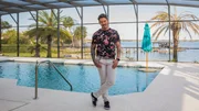 As seen on my Lottery Dream Home, host David Bromstad poses in this enclosed pool in Orlando, Florida. (portrait) As seen on my Lottery Dream Home, host David Bromstad poses in this enclosed pool in Orlando, Florida. (portrait)
