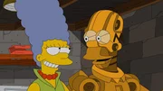 Endlich glücklich: Anders als der geklonte Homer ist der Roboter-Homer (r.) eine ganz andere Persönlichkeit als das Original und hilft Marge (l.) sogar bei der Hausarbeit ... Endlich glücklich: Anders als der geklonte Homer ist der Roboter-Homer (r.) eine ganz andere Persönlichkeit als das Original und hilft Marge (l.) sogar bei der Hausarbeit ...