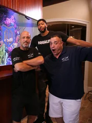 The Guys and Anthony hang out by the tank.