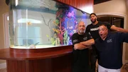The Guys and Anthony hang out by the tank.